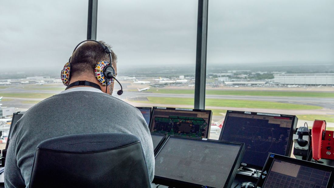 Some 56 air traffic controllers work in the tower, operating a round-the-clock shift system. The team is split into three "watches" -- so that the same group of people typically works together. Controllers make use of screens showing meteorological data such as windspeed and radar tracking of aircraft on the ground and in the air.