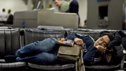 passenger asleep airport