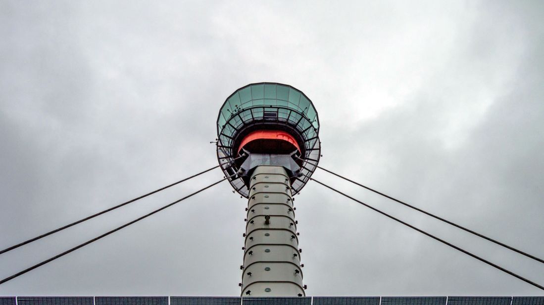 The tower stands 87 meters over the airport and features four-story high plate glass windows. An internal elevator connects to the top while an external elevator reaches part way. Staff say the tower has built-in flexibility and has been known to sway in strong winds.