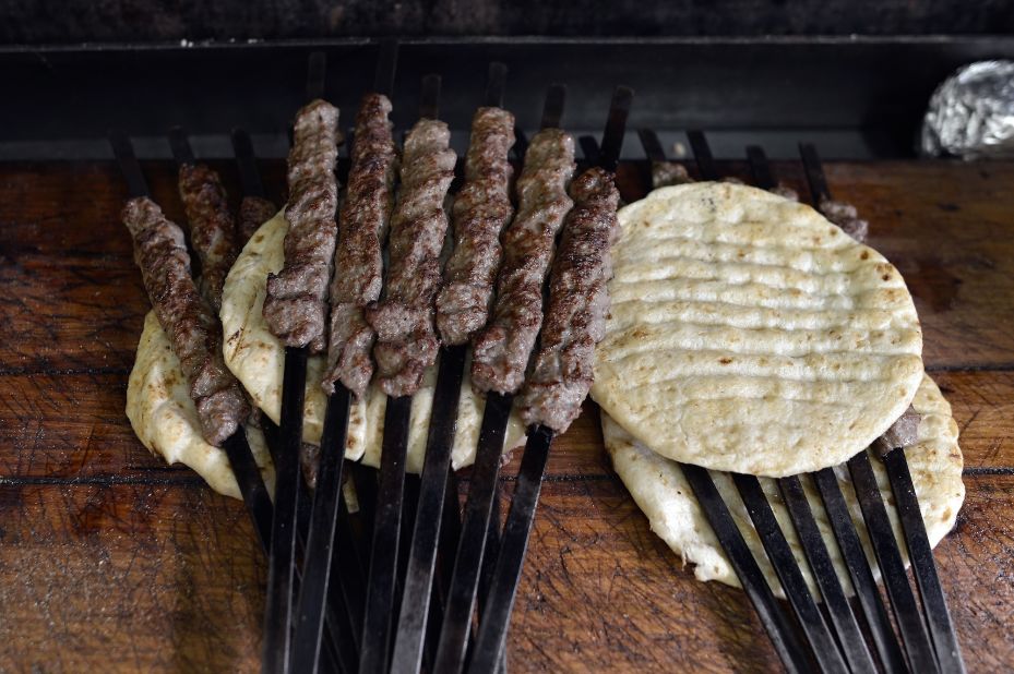 You can't go wrong with meat on a stick. Skewers of grilled kebab on pita bread await their fate at an Athens souvlaki restaurant.  