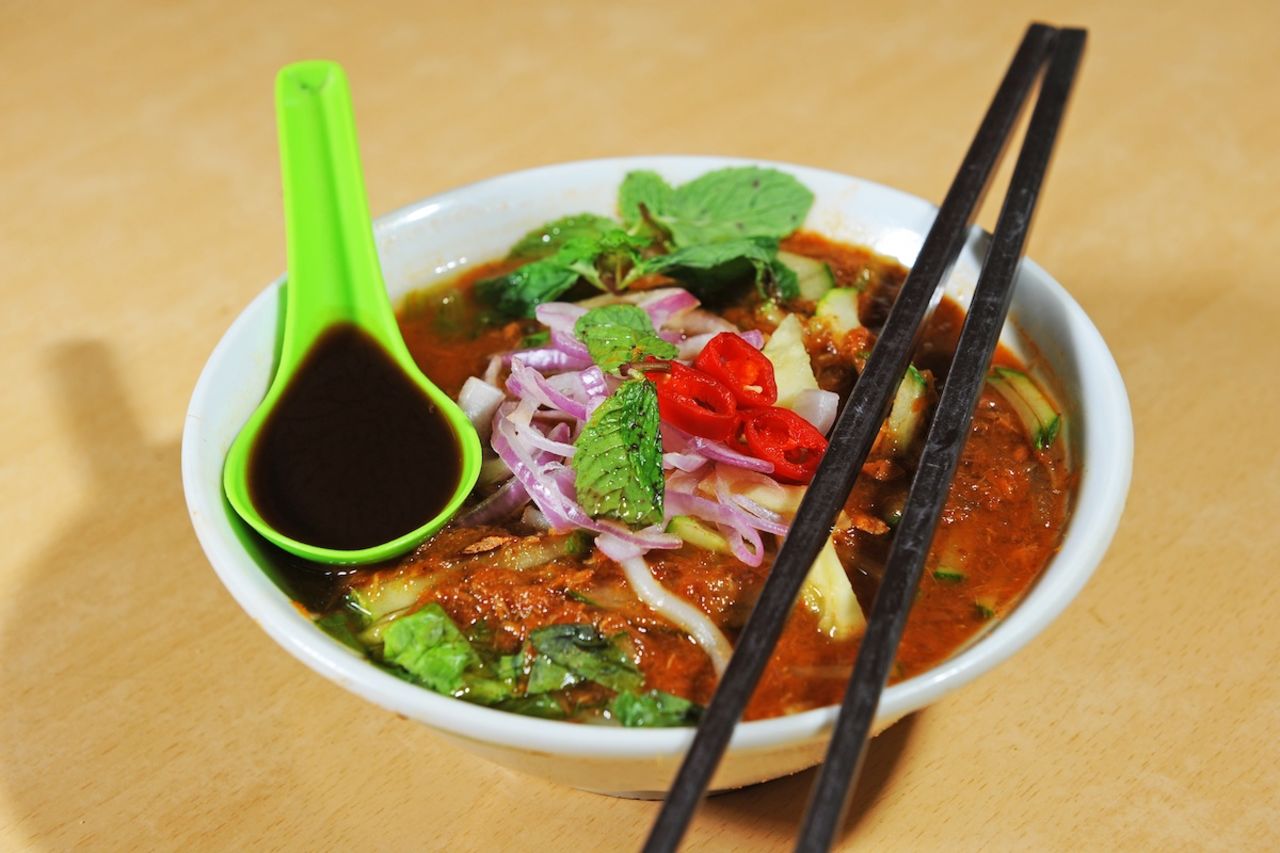 Considered one of the national dishes, spicy noodle soup called "Laksa" typically features fish or prawns and lots of chili.  