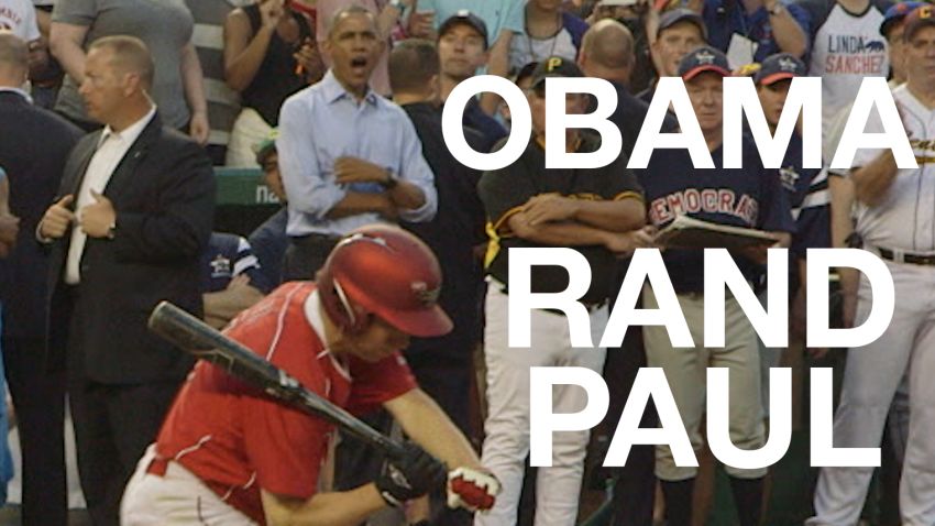 President Obama watches Senator Rand Paul
