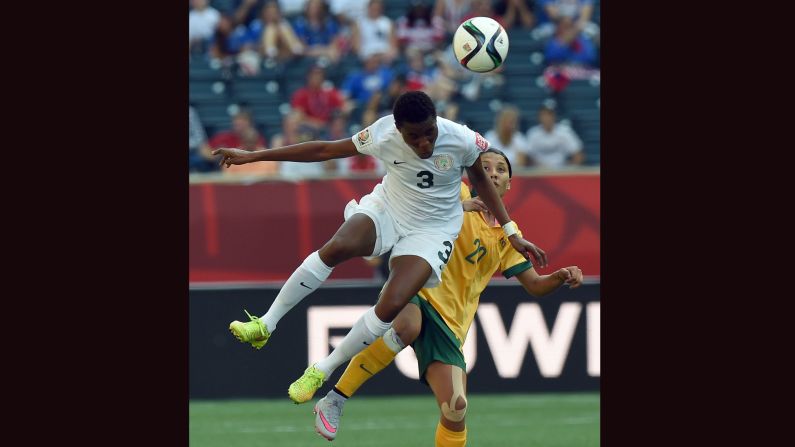 Nigeria defender Osinachi Ohale, left, and Australia forward Samantha Kerr compete for the ball. 