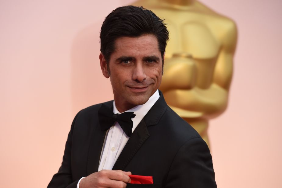 John Stamos announced in December that at the age of 54 he will become a dad as his fiancée actress Caitlin McHugh is pregnant. Other male celebs have become fathers in their later years, too.