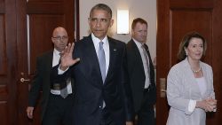 U.S. President Barack Obama and House Minority Leader Nancy Pelosi leave the Gabriel Zimmerman room on Capitol Hill, June 12, 2015 in Washington, D.C.
