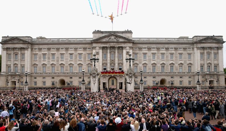 The Red Arrows fly over Buckingham Palace as part of the celebration. 