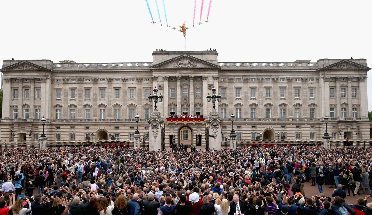 The Red Arrows fly over Buckingham Palace as part of the celebration. 