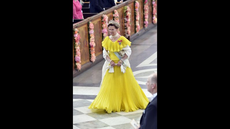 Queen Sonja of Norway arrives.