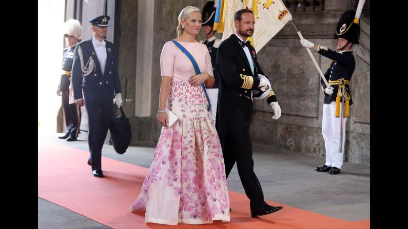 Crown Princess Mette-Marit and Crown Prince Haakon of Norway arrive for the wedding.