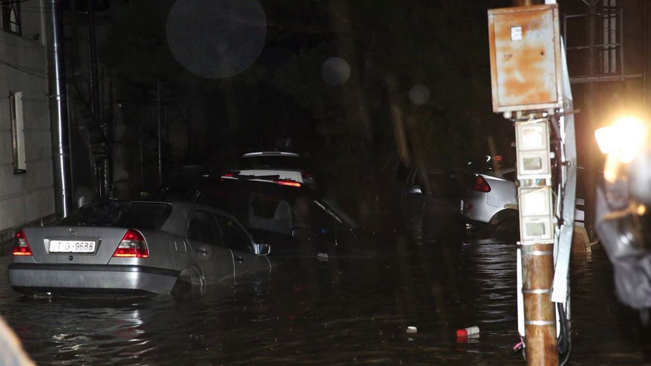Cars are partially submerged during flooding in Tbilisi, Georgia.n
