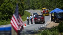 Department of Corrections officers work a roadblock in Saranac, New York on Saturday, June 13.