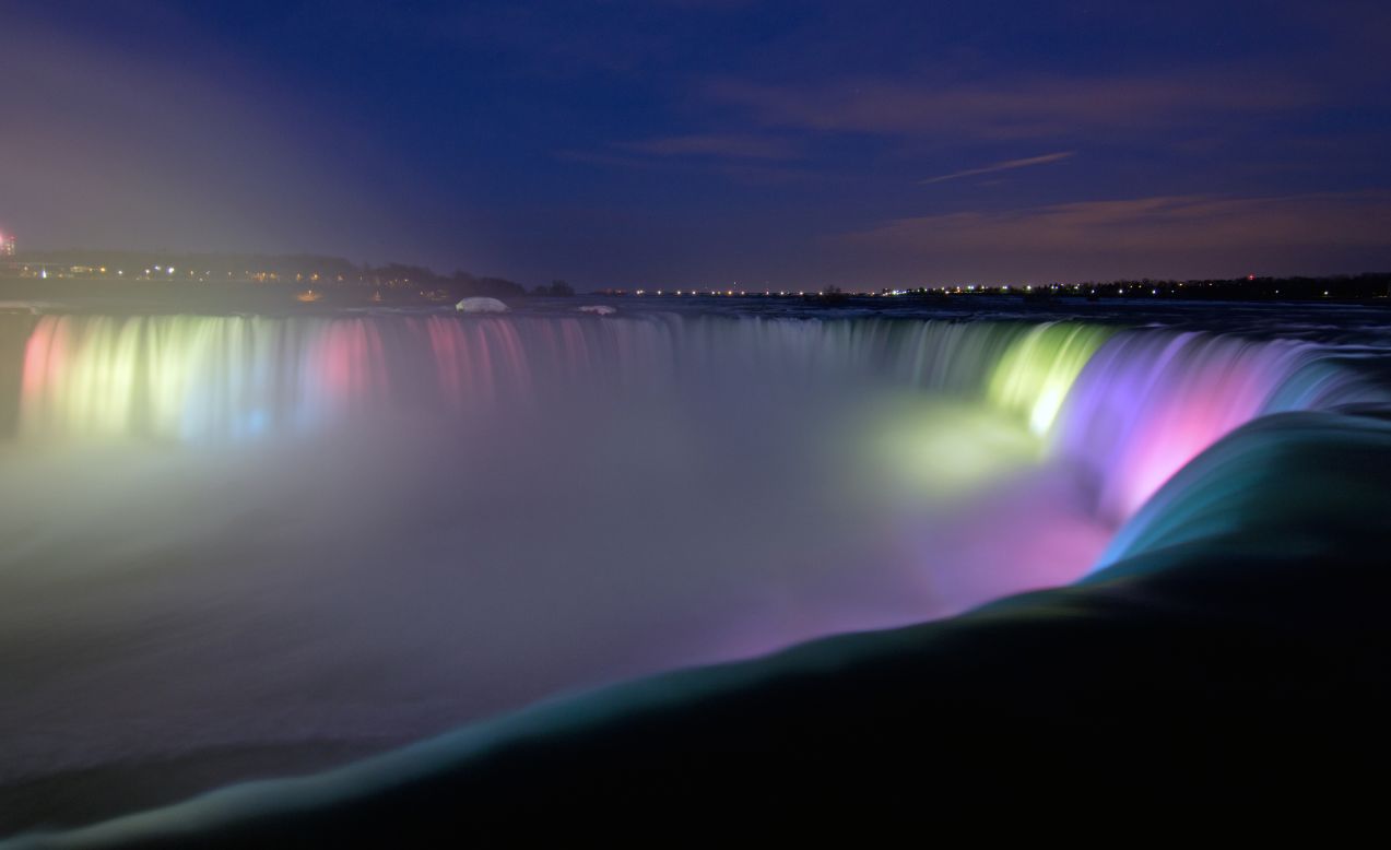 People travel from all over the world to watch the Niagara Falls each dusk, including <a href="http://ireport.cnn.com/docs/DOC-1235800">Lucie Blais</a>, the photographer that captured this image. The falls are illuminated by <a href="http://www.infoniagara.com/attractions/nightly_illumination/" target="_blank" target="_blank">21 Xenon lights</a>, each of which has 250,000,000 candlepower. 