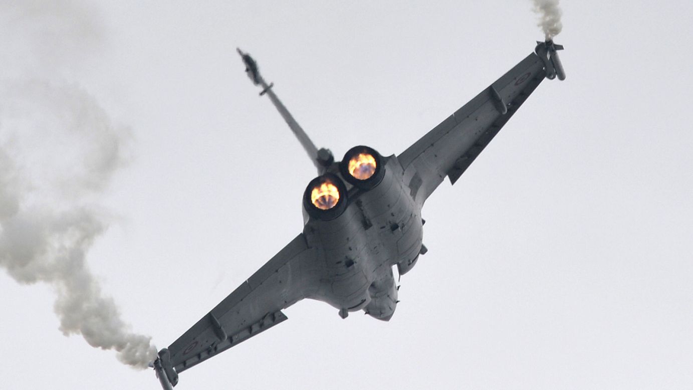 The Le Bourget Airshow is one of the biggest aviation marketplaces for civilian and military aircraft. Here a Dassault Rafale fighter jet -- used in conflicts in Afghanistan, Libya and Iraq -- performs over the event. 