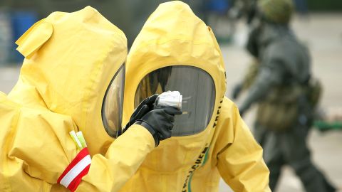 Rescue workers take part in a trial in 2008 in Tokyo, Japan, to improve the city's response to a "dirty bomb" attack. 