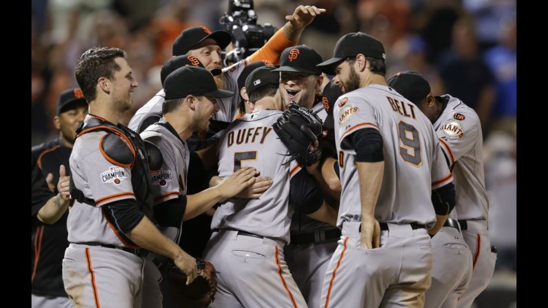 Chris Heston, facing the camera, is mobbed by his San Francisco Giants teammates after throwing a no-hitter Tuesday, June 9, in New York. The rookie right-hander struck out 11 Mets in what was only his 13th Major League start.