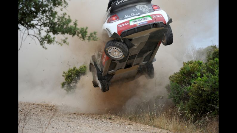 The Citroen of Kris Meeke crashes Friday, June 12, during the World Rally event in Alghero, Italy. Meeke went on to finish the stage after the car was repaired.