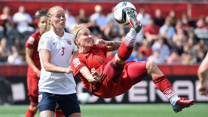 Germany's Anja Mittag performs an overhead kick while playing Norway in the Women's World Cup on Thursday, June 11. Mittag scored a goal in the match as the teams tied 1-1 in Ottawa.