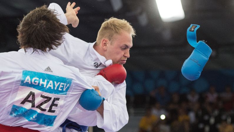 At the European Games, a glove goes flying during the karate semifinal between Germany's Noah Bitsch and Azerbaijan's Rafael Aghayev on Saturday, June 13. Aghayev won the match and went on to win the final of his weight class as well.
