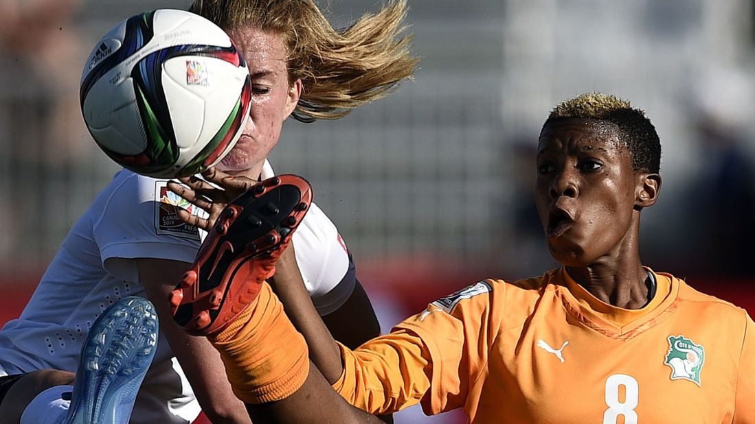 Norway midfielder Ingrid Schjelderup, left, competes for the ball with Ivory Coast forward Ines Nhrehy.