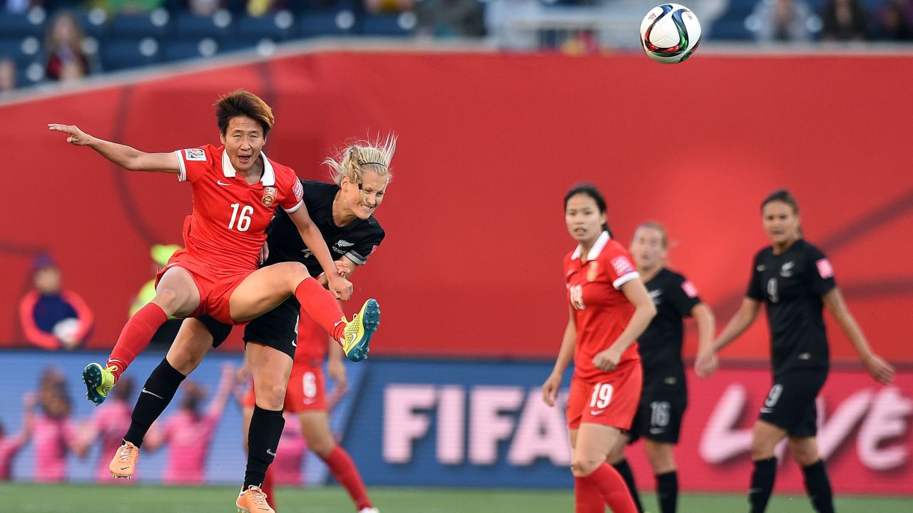 New Zealand midfielder Katie Duncan, second from left, collides with China forward Lou Jiahui.