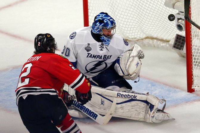 Duncan Keith, defenseman for the Chicago Blackhawks, scores on Tampa Bay's Ben Bishop during Game 6 of the Stanley Cup Final on Monday, June 15. The Blackhawks won the game 2-0 to clinch the Stanley Cup. Keith won the Conn Smythe Trophy for being the NHL playoffs' most valuable player.