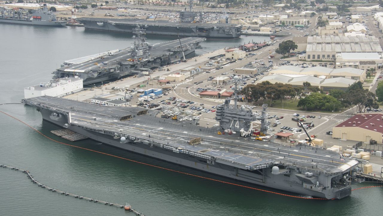 Three Nimitz-class aircraft carriers USS Carl Vinson (CVN 70), top, USS Ronald Reagan (CVN 76), center, and USS John C. Stennis (CVN 74) are pierside at Naval Air Station North Island near San Diego on June 12, 2015. The Vinson has just recently returned from a 10-month deployment. The Reagan is preparing for a move to Japan later this year and the Stennis was making a port call after steaming from its homeport of Bremerton, Washington.