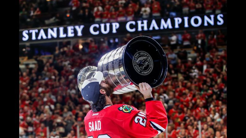 Brandon Saad of the Chicago Blackhawks celebrates with the Stanley Cup on Monday, June 15, after Chicago defeated the Tampa Bay Lightning to win their third championship in the last six years.