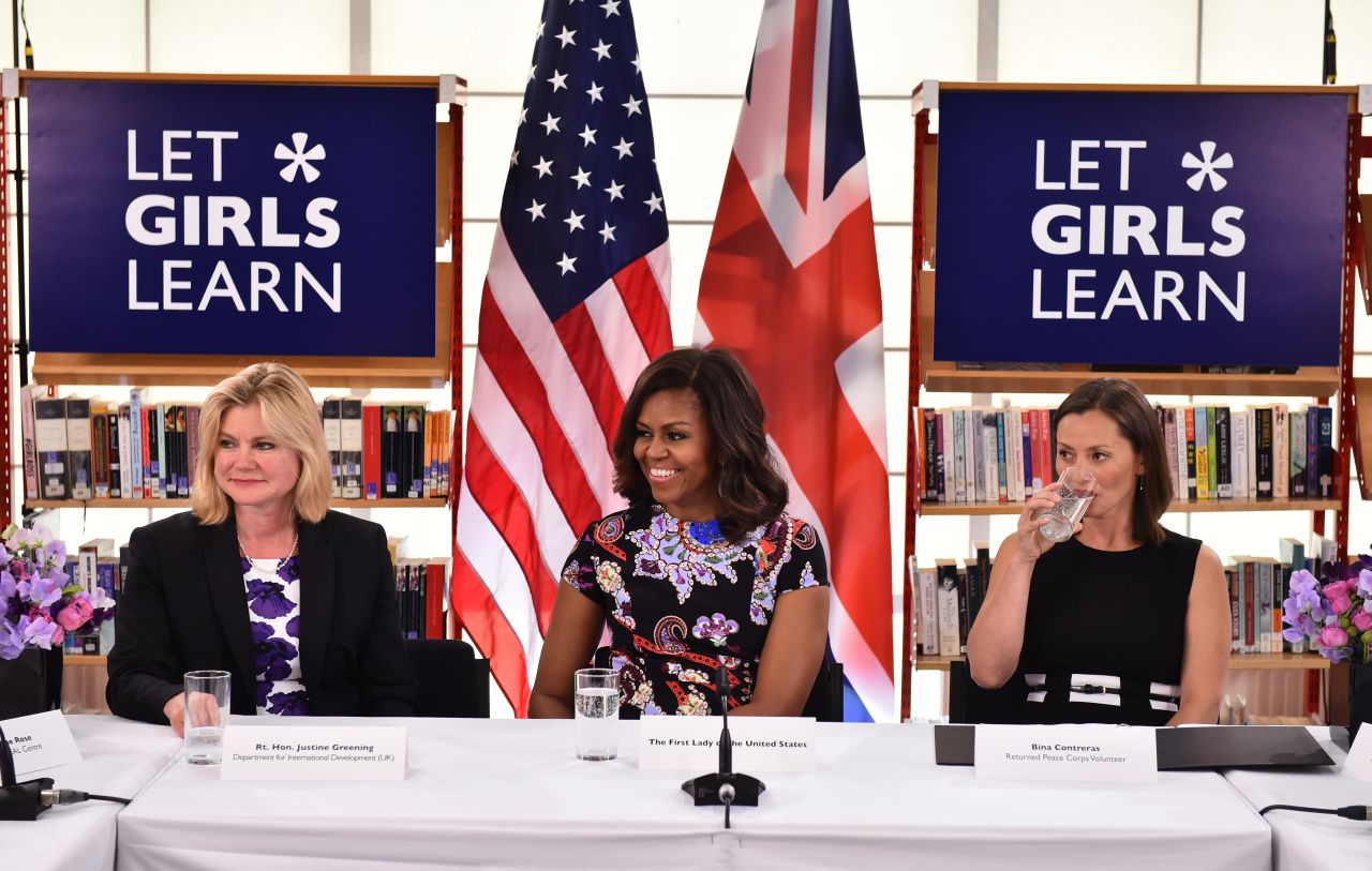 Obama sits between the UK Department of International Development's Justine Greening, left, and Peace Corps volunteer Bina Contreras at the Mulberry School for Girls on June 16.