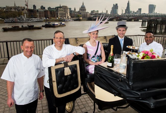 Caines (far right) unveiled the menu at a photocall alongside London's River Thames in the build-up to Ascot.