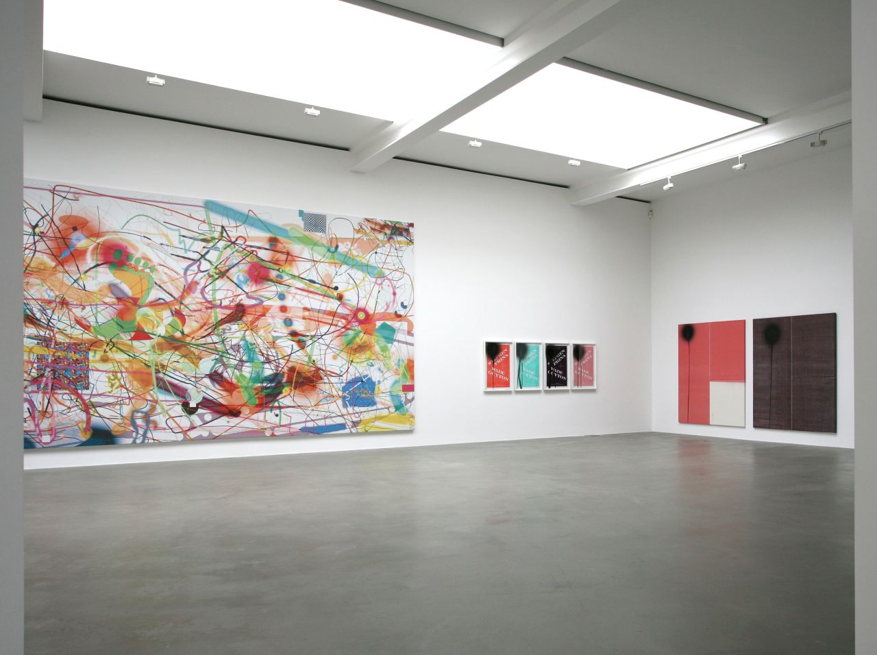 Another piece by Oehlen on the left is joined by works featuring Joseph Logan, Stephen Prina and Wade Guyton. The paintings on the far right made use of two entire cans of spray paint focused on one area of the composition.