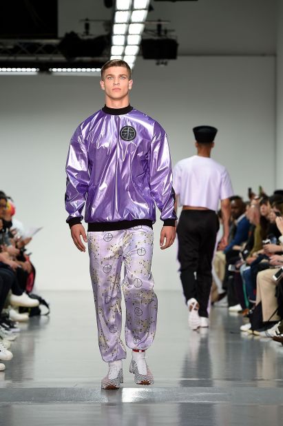 In her show notes, Danish-born Astrid Andersen wrote that she used hip-hop stars A$AP Ferg and Missy Elliott as her muses for the collection, which pays homage to those "who dare to dress bravely and have a point of view." She merged sportswear with elements of traditional Chinese dress, such as the changshan, creating looks that are bold and delicate at the same time.