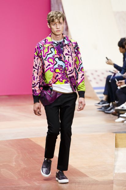 For Coach's first-ever runway show, designer Stuart Vevers dismantled the idea that the American label only does leather goods. He has described the collection as "Kennedy boys meet Beach Boys meet Beastie Boys," and that comes through in the neon coloring and kitsch fanny packs. 