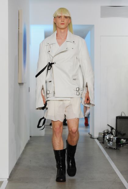 Todd Lynn has designed for U2, The Rolling Stones and Mick Jagger. That rock aesthetic comes through in this study in white. The leather jacket, the translucent shorts, the black leather boots — it all teems with rebellion. 