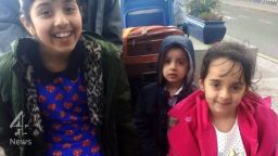 In this family photo handout three of the children are seen outside an airport.