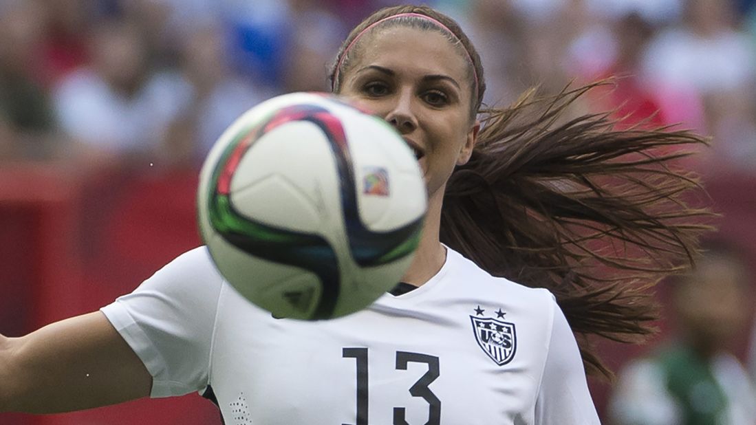 Morgan, making her first start of the tournament, keeps her eye on the ball against Nigeria.