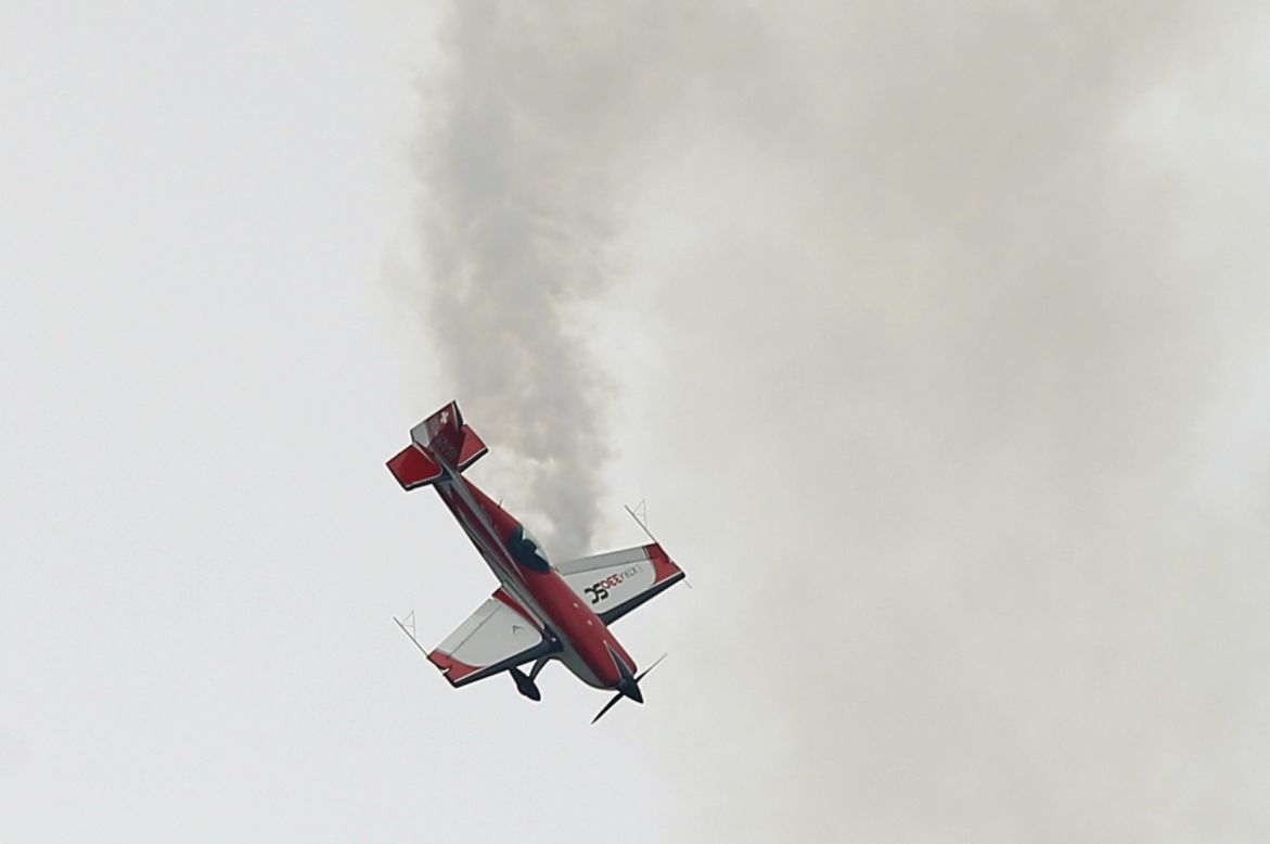 French pilot Catherine Maunoury flies a low-wing aerobatic Extra SC 330. The Extra SC is the only single-pilot plane created by Extra Aircraft Company, which designs acrobatic aircraft. 