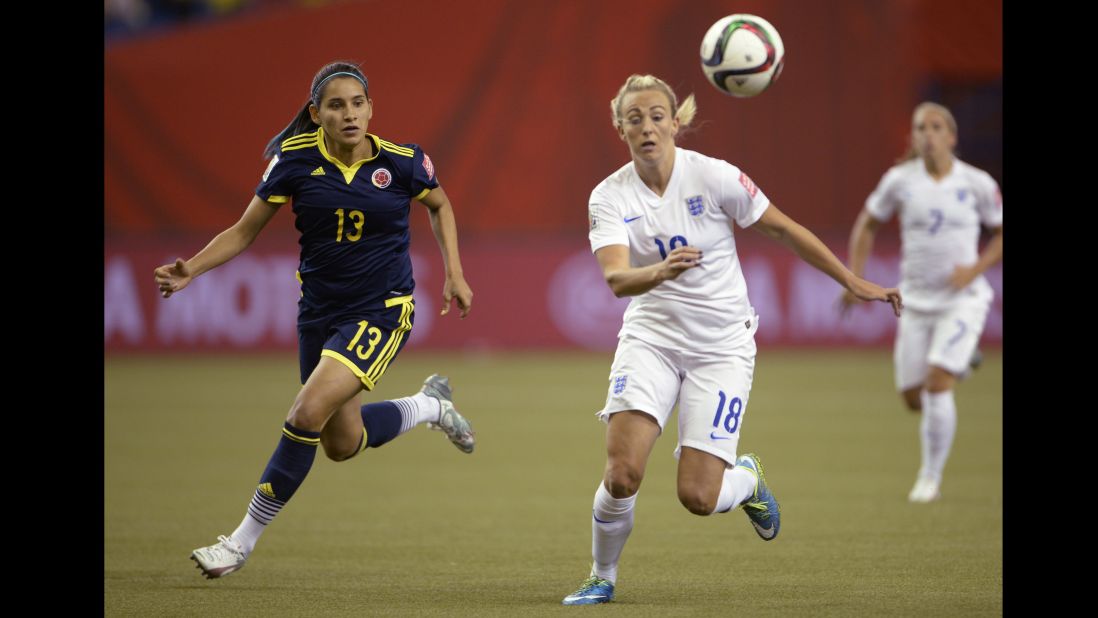 Colombia's Angela Clavijo and England's Toni Duggan chase the ball. 