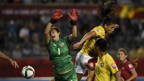 Costa Rican goalkeeper Dinnia Diaz competes for the ball.