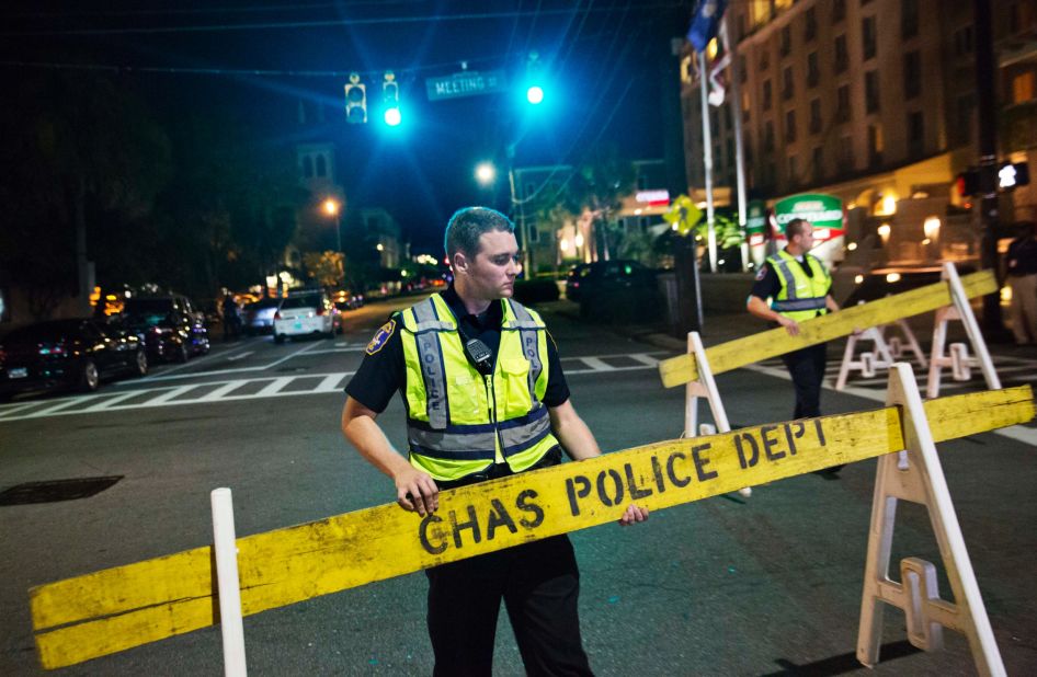 Police close off a section of Calhoun Street near the scene of the shooting.