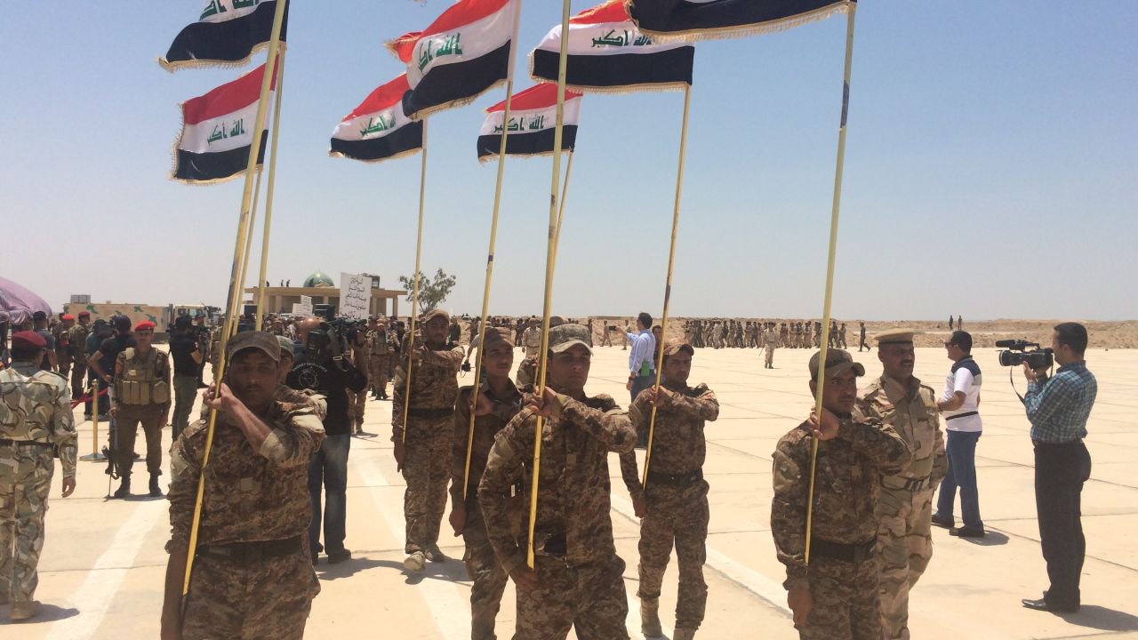 Sunni volunteers marching during their graduation ceremony at Al-Taqaddum Air Base, Habbaniya, Iraq.