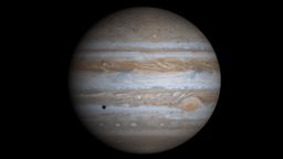This image of Jupiter is a composite of four images taken by NASA's Cassini spacecraft in December, 2000. The images were combined to illustrate what Jupiter would look like if the cameras on Cassini  had captured the entire planet. Jupiter's moon Europa is casting the dark shadow on 