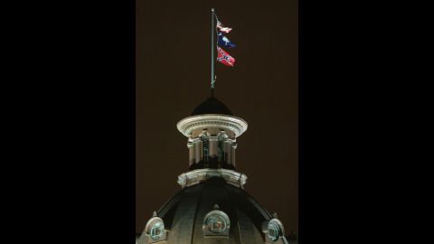 The Confederate flag flies on the dome of the Statehouse in Columbia, SC, before it is moved. 
