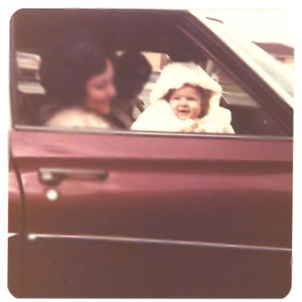 <a href="http://ireport.cnn.com/docs/DOC-1248898">Elena Monaco</a> shared this photo of herself as a baby riding in the front seat of her car. She is sitting her godmother's lap in her godparent's car in 1976. Because she was so young, Monaco does not remember much of the '70s, but finds the clothes, and the relaxed child car seat laws, fascinating. 