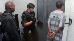 Caption:NORTH CHARLESTON, SC - JUNE 19: In this image from the video uplink from the detention center to the courtroom, Dylann Roof leaves a hearing at Centralized Bond Hearing Court June 19, 2015 in North Charleston, South Carolina. Roof is charged with nine counts of murder and firearms charges in the shooting deaths at Emanuel African Methodist Episcopal Church in Charleston, South Carolina on June 17. (Photo by Grace Beahm-Pool/Getty Images)