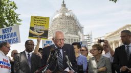 U.S. Senate Budget Committee ranking member Senator Bernie Sanders, center, I-Vermont, speaks during a news conference to discuss legislation to restore pension guarantees for thousands of retired union workers, in front of the US Capitol in Washington, D.C., June 18, 2015.