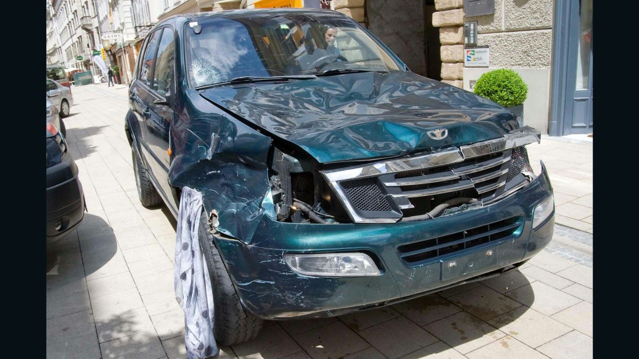 Image #: 37722130    epa04810403 A SUV which drove into pedestrians stands at the scene of crime in the city center of Graz, Austria, 20 June 2015.  According to reports, a man drove his SUV into a group of people and attacked them with a nkife aftwerwards. Two people were reported dead, several injured, and the man arrested.  EPA/ELMAR GUBISCH /LANDOV