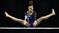 Malaysia's Farah Ann Abdul Hadi competes on the uneven bars during the women's individual all-around gymnastics final at the 28th Southeast Asian Games (SEA Games) in Singapore on June 8, 2015. AFP PHOTO / ROSLAN RAHMAN (Photo credit should read ROSLAN RAHMAN/AFP/Getty Images)