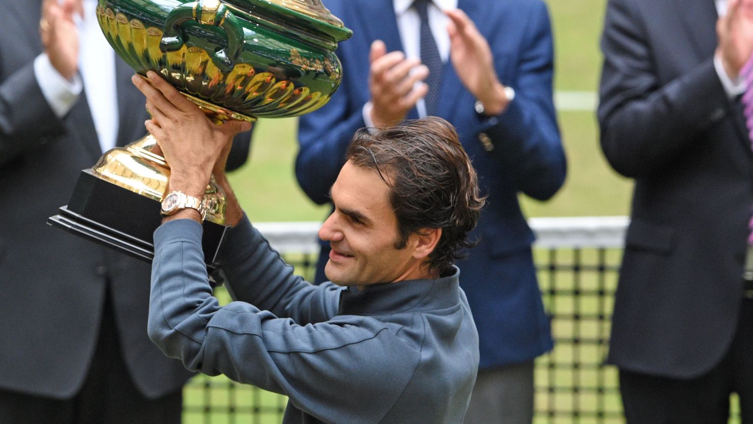 Roger Federer lifts the Halle crown for the eighth time after beating Andreas Seppi of Italy in the final.