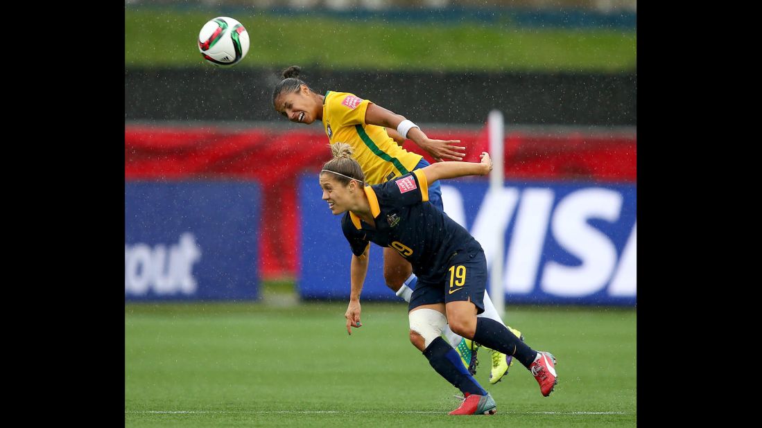 Fabiana heads the ball above Australia's Katrina Gorry.