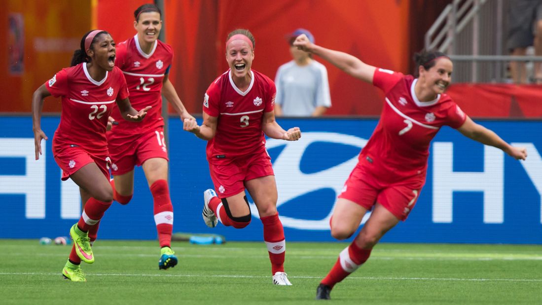 From left, Canada's Ashley Lawrence, Christine Sinclair, Josee Belanger and Rhian Wilkinson celebrate Belanger's goal against Switzerland on Sunday, June 21. Canada won the round-of-16 match 1-0 in Vancouver.